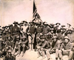Teddy Roosevelt and his Rough Riders (featured on cover art).